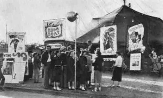 People waiting to enter the Music Circus tent at the State Fair of Texas