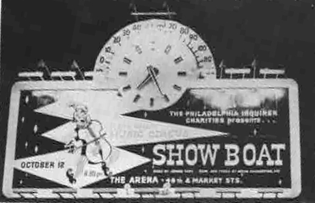 A Philadelphia billboard with the Music Circus logo advertises that 'Show Boat' will be the presentation at the Arena