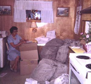 Mailbags in the kitchen waiting to be delivered to the post office.